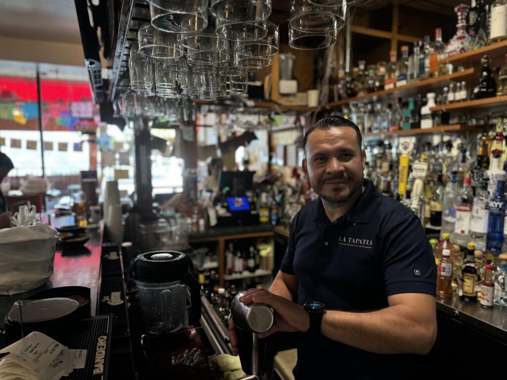 Man preparing baverage at the baverage counter of La Tapatia Concord