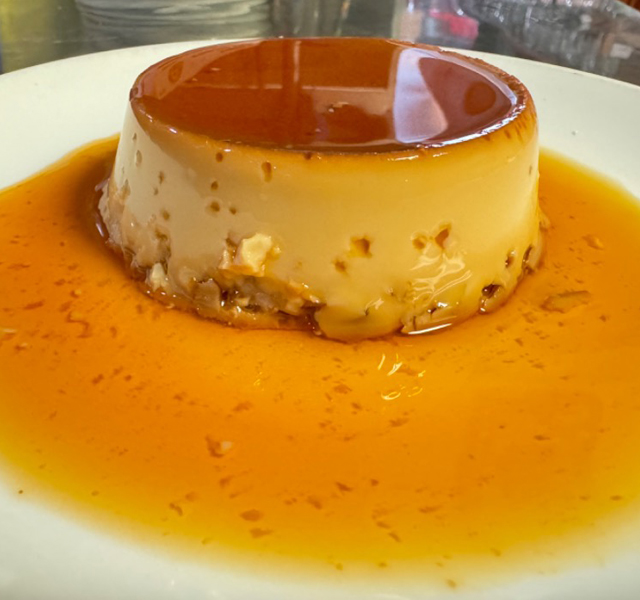 Creamy traditional flan with a rich caramel topping, served at La Tapatia