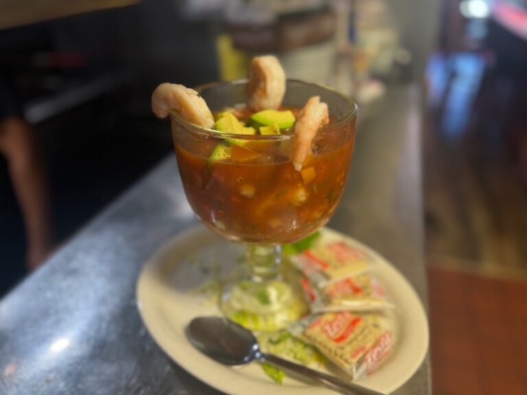 Mexican Shrimp Cocktail with three shrimp, avocado, and cilantro served by La Tapatia